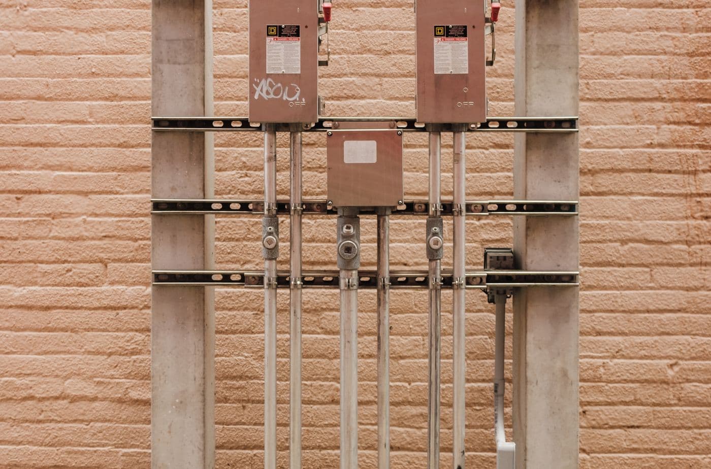 Open electrical distribution box showing internal wiring and connections